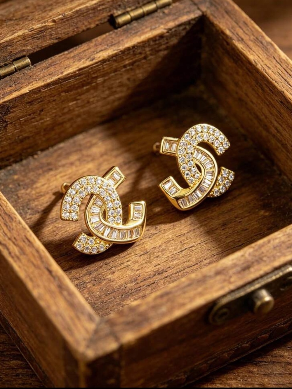 Gold Crystal Interlocking Stud Earrings - Gleaming Gold Tone